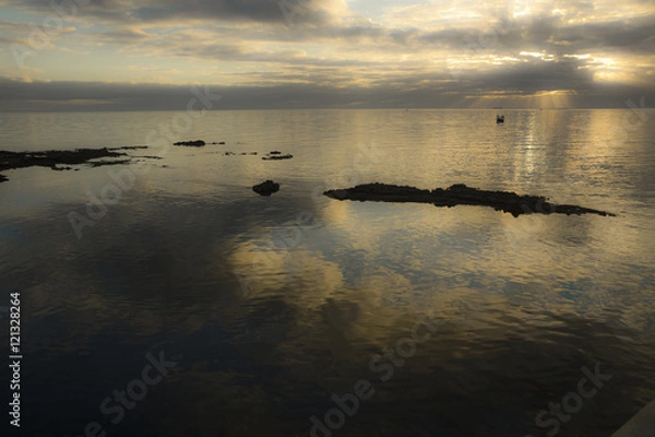 Obraz Misty Bay at Sunset with rocks