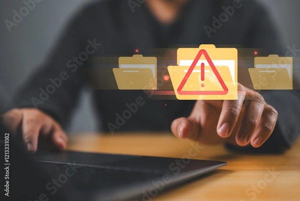 Fototapeta Cybersecurity alert with digital file folder. hand interacting with a cybersecurity alert symbol. virus, spyware, malicious software, malware, or cyberattacks on computer networks.