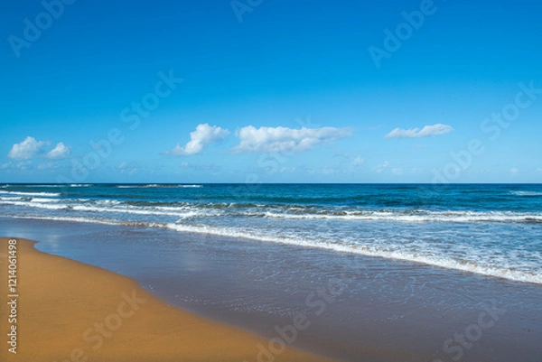 Obraz Cyprus Alagadi Turtle Beach. View from the beach to the sea. Magnificent beach, sea and blue cloudy sky. Yellow sand beach. Beach and blue sky.