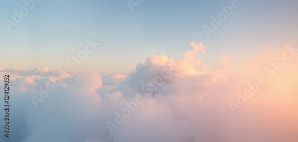 Fototapeta Fluffy clouds stretch across the sky, illuminated by warm sunset colors. The gentle blend of pink, orange, and blue creates a tranquil and beautiful scenery, inviting calm reflections