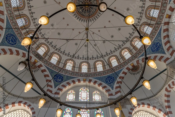 Fototapeta interior of historical Rustem Pasha Mosque at sunset. Ottoman architecture by Mimar Sinan shines amid peaceful rays, capturing a spiritual ambiance. Ramadan, islamic, muslim.