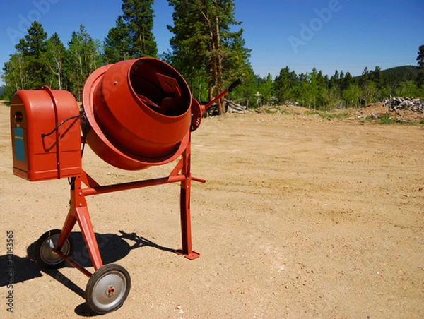 Obraz Cement mixer on a new construction site