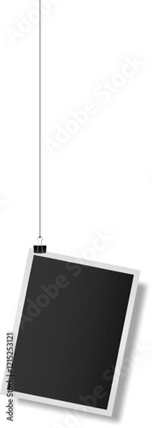 Fototapeta Photo frame hanging with binder clip showing a blank space where you can add your content, perfect for showcasing your designs or creating personalized memories
