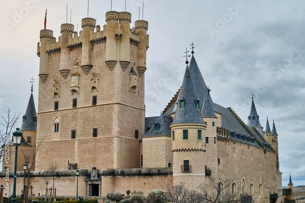 Fototapeta The Alcázar of Segovia, a historic fortress and fairytale-like castle in Castilla y León, Spain, showcasing its iconic architecture and cultural significance