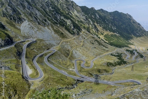 Obraz Transfagarasan - High altitude winding road in Carpathians mountains panorama. Aerial view.