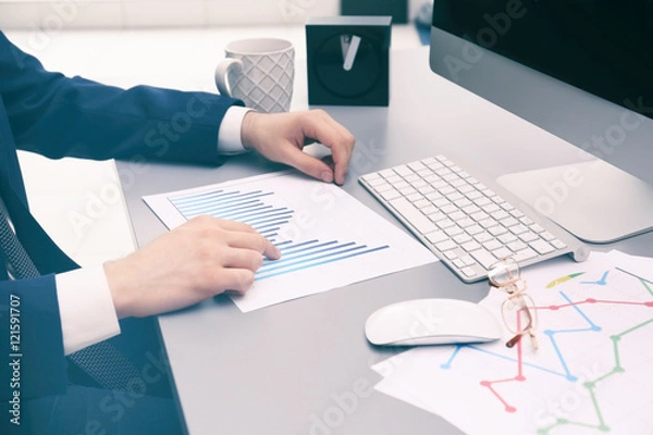 Fototapeta Businessman working in office