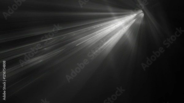 Fototapeta A monochromatic image showcasing beams of light emanating from a dark background.