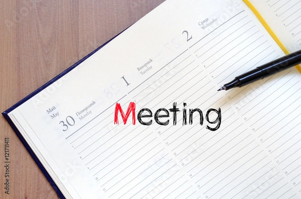 Fototapeta Meeting text concept on notebook