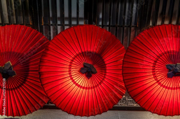 Fototapeta Cute and colorful Japanese umbrellas drying after the rain in Kyoto