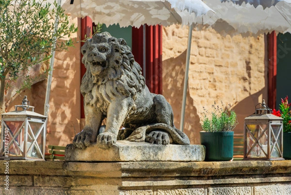 Fototapeta Historic street and Stone gate on Upper town in Zagreb, capital of Croatia with beautiful stone statue of lion.