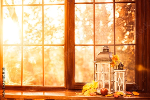 Fototapeta Vintage lanterns at the windowsill. Autumn background