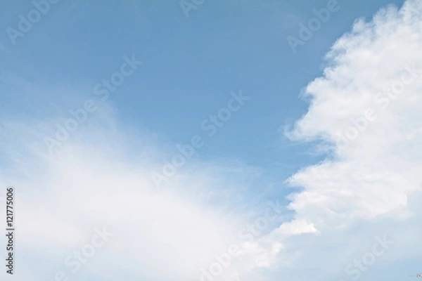 Fototapeta Blue sky background with white clouds closeup, sky daylight, natural sky composition