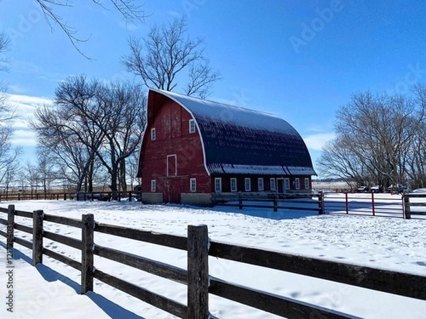 Obraz An iconic Gothic style livestock barn in the snow