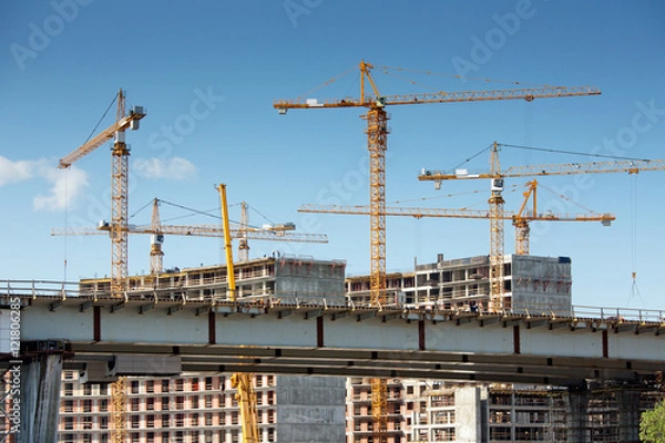 Fototapeta Cranes and building construction