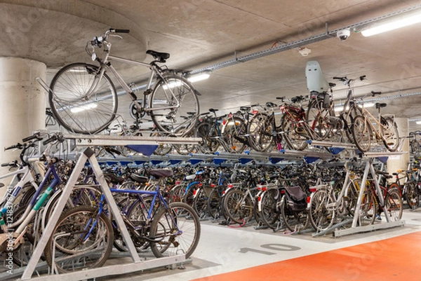 Obraz Bicycle parking. Garage for bicycles. Two-level parking for bicycles.