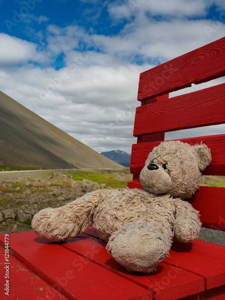 Fototapeta Teddy on red chair