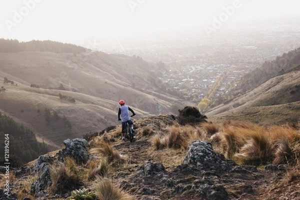 Obraz Mountain Biker Looking Out Over City