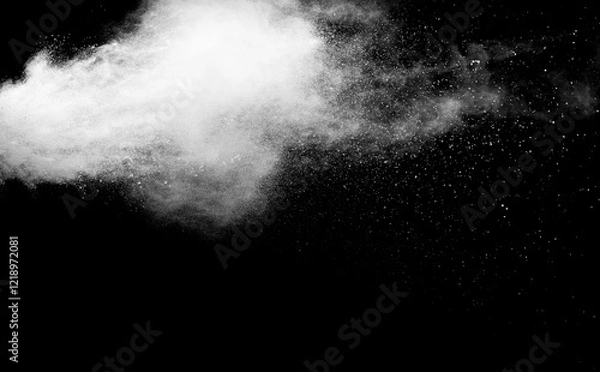 Obraz White powder explosion isolated on black background.White dust particles splash.