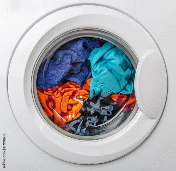 Obraz Washing machine with color clothes
