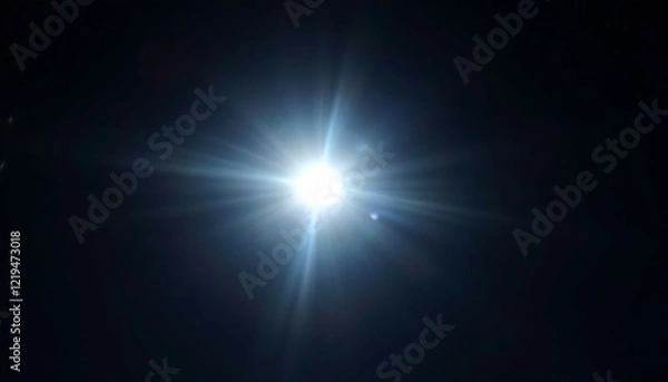 Fototapeta Radiant Starburst: A Celestial Light Display in Dark Serenity