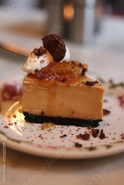 Fototapeta Plated slice of chocolate cheesecake at an upscale restaurant in downtown Minneapolis, Minnesota.