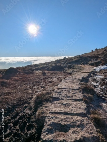 Fototapeta Mountain path above the clouds