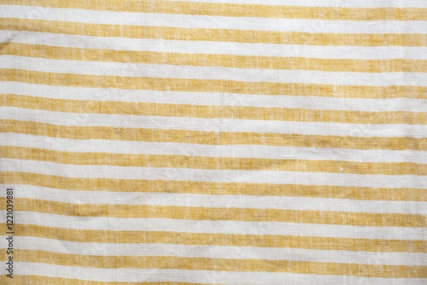Fototapeta Yellow and white striped fabric with a rustic, woven texture. A seamless, natural pattern ideal for backgrounds, textiles, or decorative designs