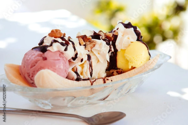 Fototapeta Ice Cream Banana split with chocolate sauce