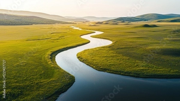 Obraz A long river runs through a grassy plain