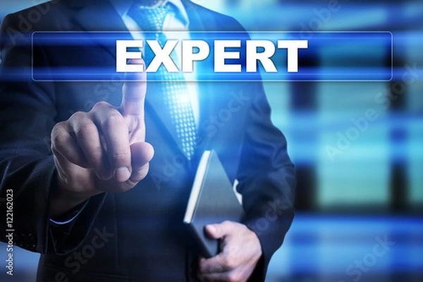 Fototapeta Businessman is pressing button on touch screen interface and selecting "Expert". Business concept.
