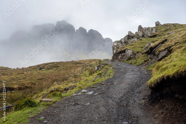 Fototapeta hiking path with a misty background to the Old Man of Storr on the Isle of Skye, Scotland, UK