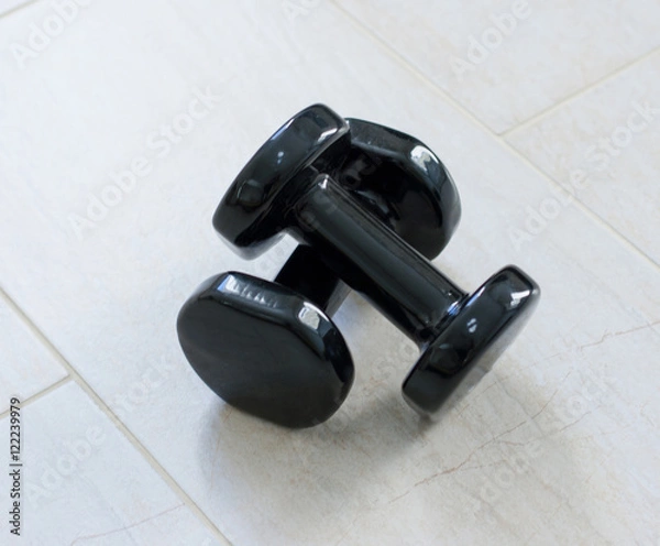 Obraz dumbbells on the floor
