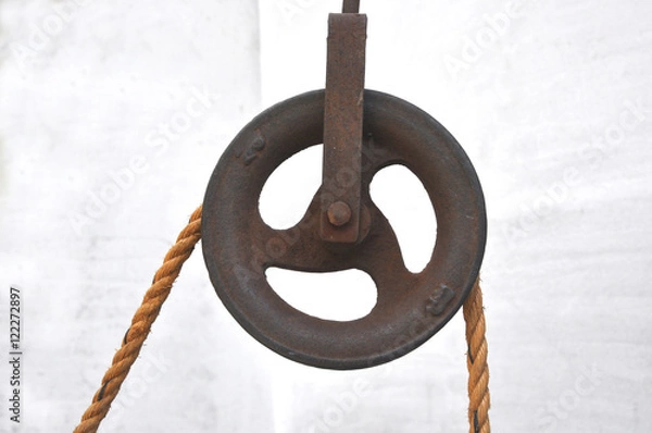Obraz Iron pulley with jute rope.
