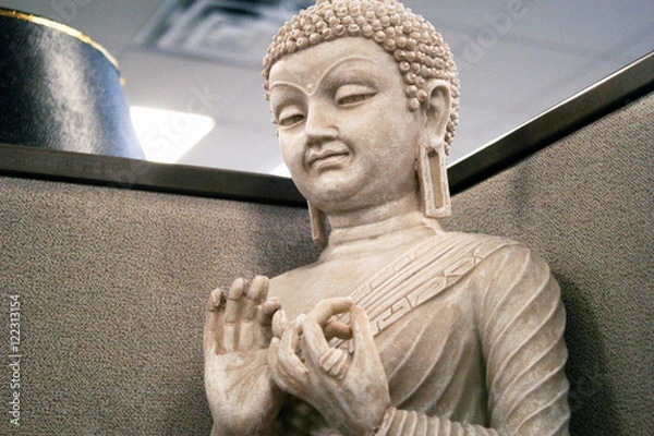 Obraz Buddha statue in an office