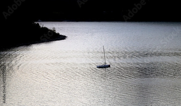 Obraz Photos of lakes and yachts at sunset