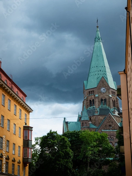 Obraz Old building against the storm clouds