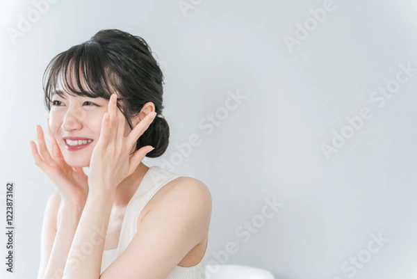 Fototapeta 美容・エステ・スキンケア・コスメ・アンチエイジングのイメージのアジア人女性
