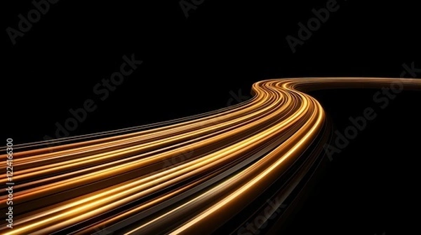 Fototapeta A long, winding trail of golden light against a black background, suggesting motion and speed through a dark landscape.