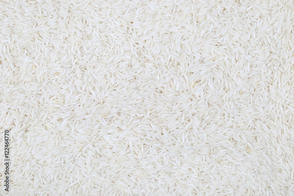 Obraz White rice grains evenly layer background horizontal