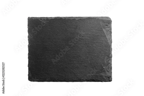 Fototapeta Black slate serving board with a natural rough texture and uneven edges, isolated on a white background. Ideal for food presentation or rustic decor