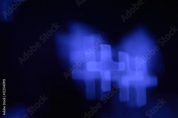 Fototapeta Blue bokeh cross lights