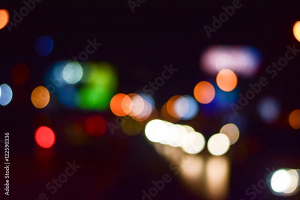 Fototapeta Abstract blurry traffic road bokeh light view from inside a car