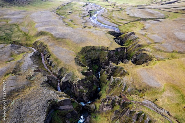 Obraz Breathtaking aerial drone view of a serene river winding through a majestic Fjadrargljufur Canyon in Iceland
