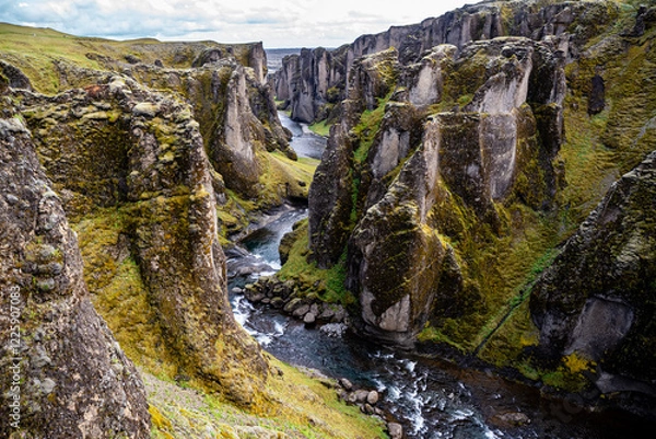 Obraz Breathtaking aerial drone view of a serene river winding through a majestic Fjadrargljufur Canyon in Iceland