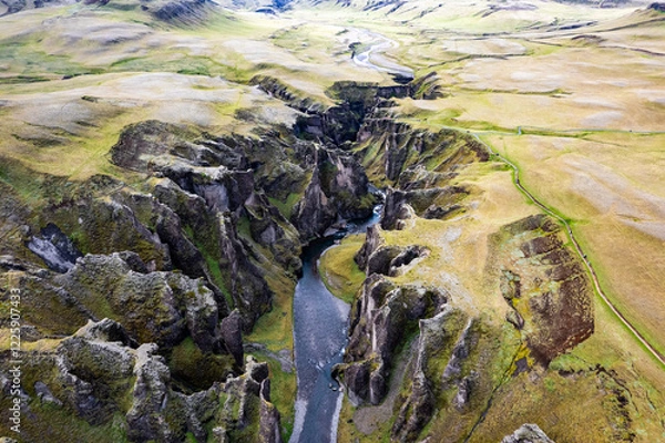 Obraz Breathtaking aerial drone view of a serene river winding through a majestic Fjadrargljufur Canyon in Iceland