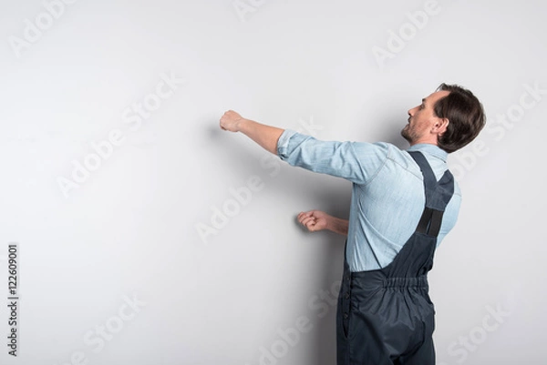 Obraz Pleasant man involved in work