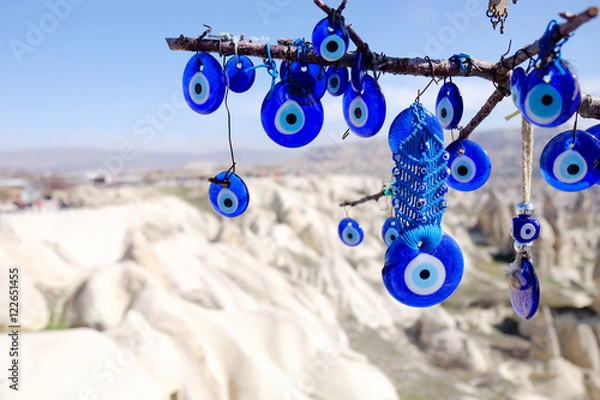 Obraz Evil eye charms hang from a tree in Cappadocia, Turkey