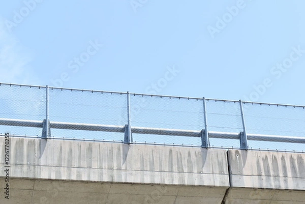 Obraz Elevated road fence and guardrail.