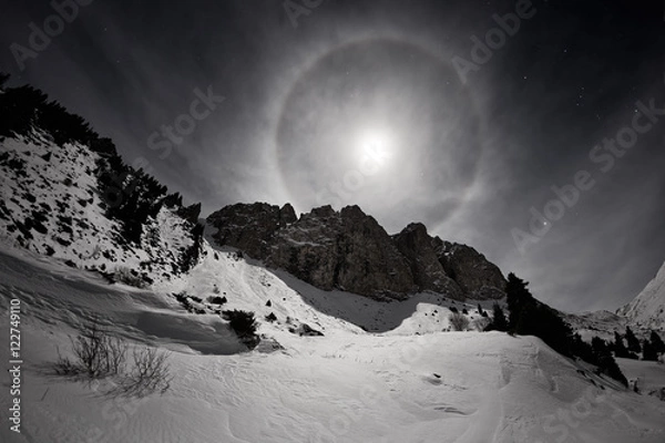 Fototapeta Full moon with halo in Small Almaty Gorge, Tian Shan mountains, Kazakhstan