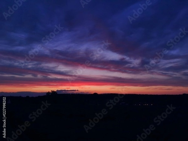 Fototapeta sunset over the mountain